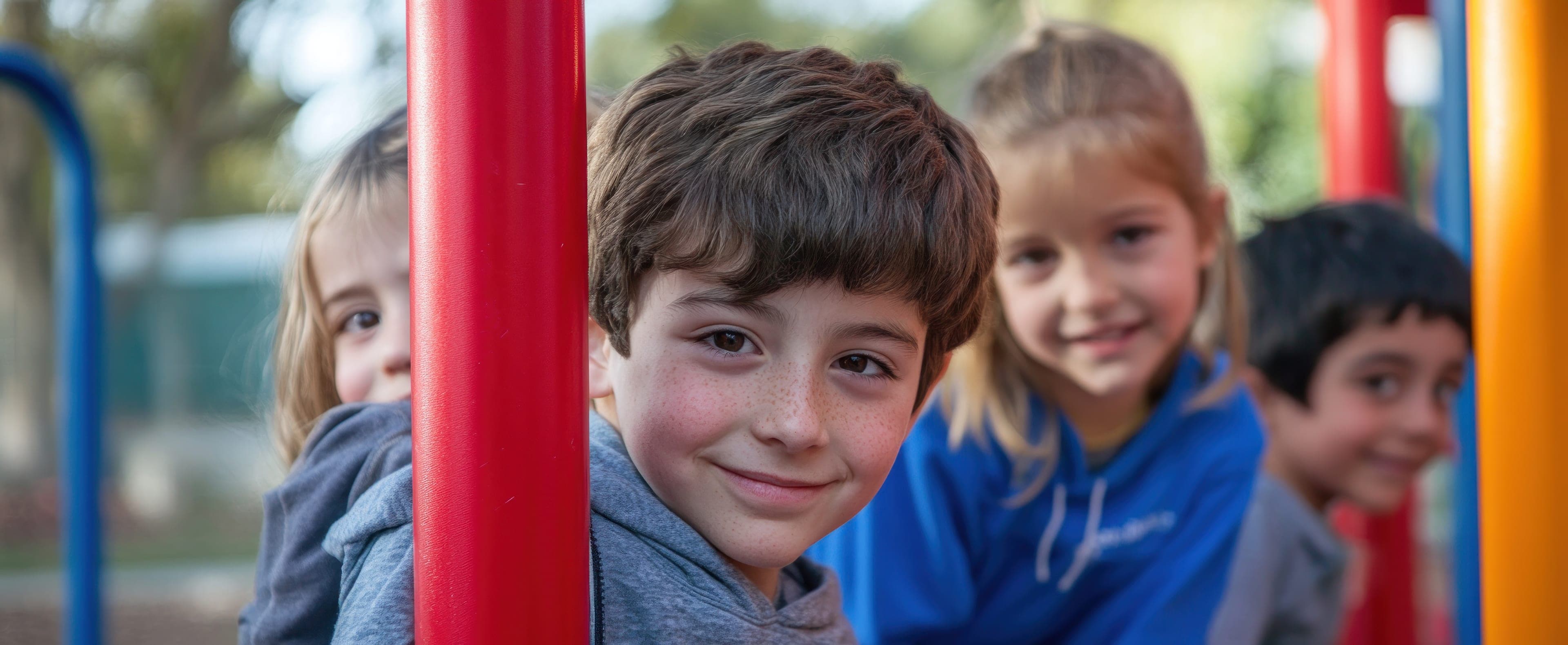 Students smiling on the playground
